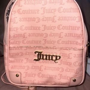 Light pink Juicy Cutour back pack style purse.